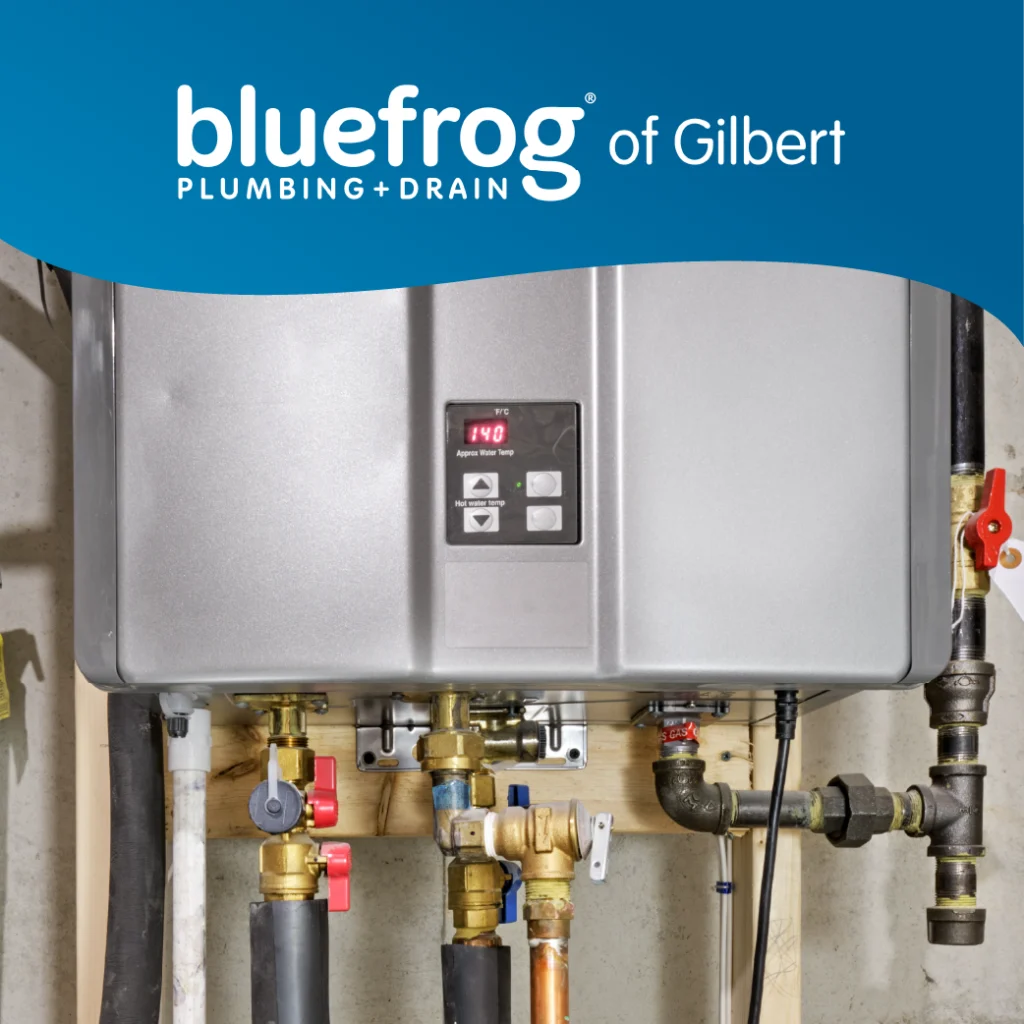 A tankless water heater with a digital display is installed, featuring the "bluefrog of Gilbert" logo
